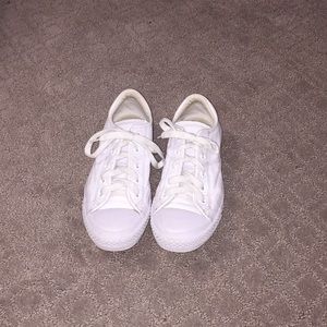 all white converse / leather texture